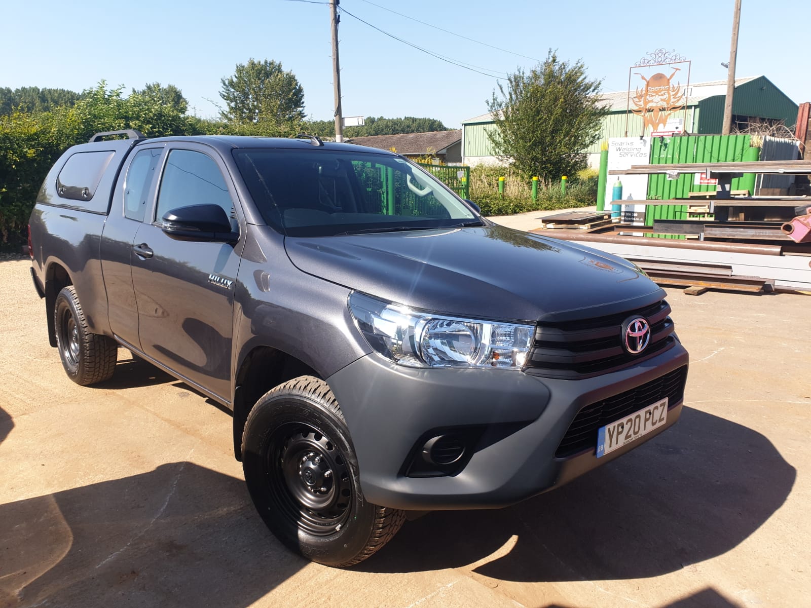 Toyota Hilux pickup truck available for commercial hire near Heathrow